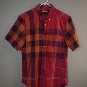 Burberry Brit short-sleeve button-down. It’s a solid piece—clean, cla